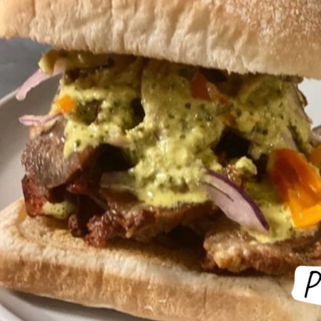 Pan Con Chicharron Sandwich & Fries.